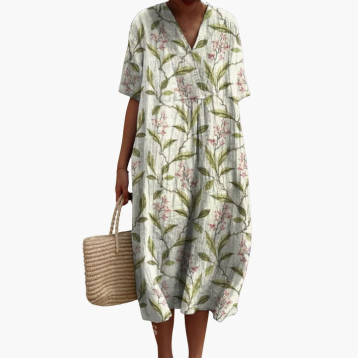 Light, breathable floral V-neck midi dress for women, short sleeve, oversized casual summer wear.