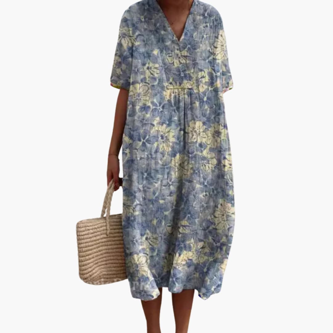 Casual oversized women's floral V-neck short sleeve midi dress, perfect for summer vacation or everyday.