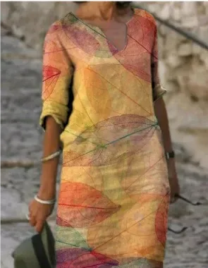 High-fashion women's floral midi dress with an abstract artistic face print, v-neck cut