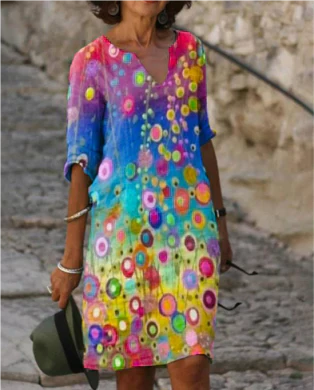 Full shot of a model wearing a women's floral V-neck midi dress with artistic face print