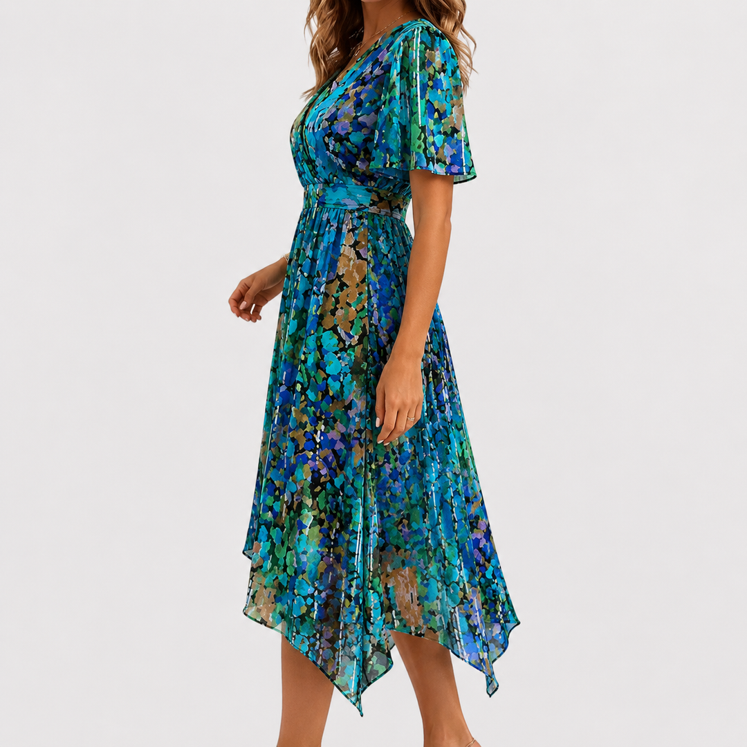 Close-up of a women's floral V-neck midi dress, highlighting delicate flutter sleeves & print.