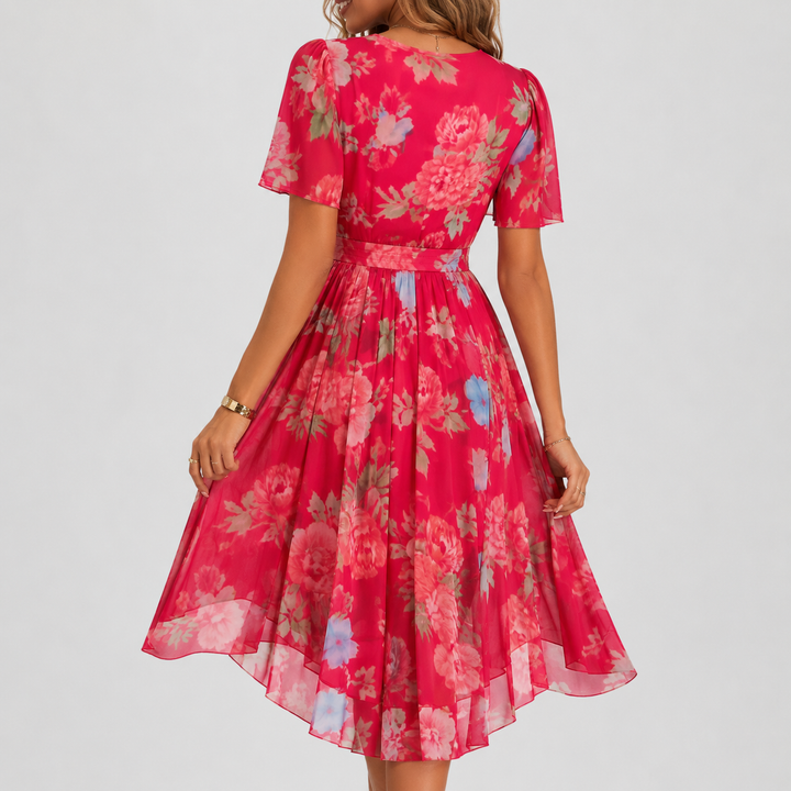 Graceful floral V-neck midi dress with flutter sleeves, ideal for special occasions & spring fashion.