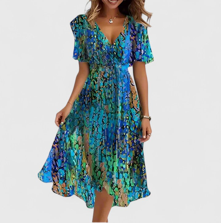 Stylish women's floral V-neck midi dress with flutter sleeves and a chic high-low hem design.