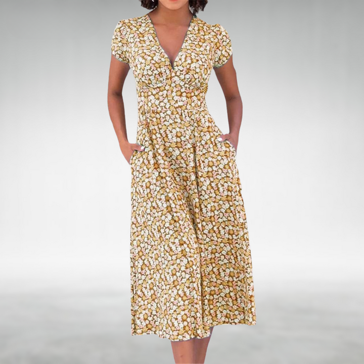 Lightweight, short-sleeve women's floral midi dress with a V-neckline and convenient side pockets for summer.