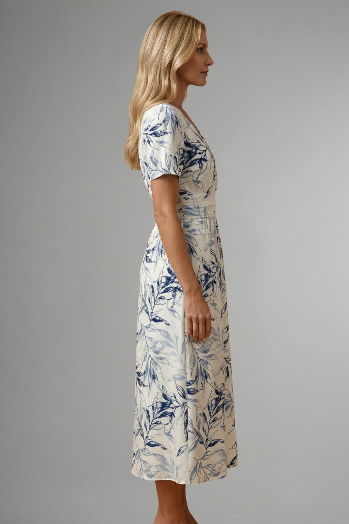 Comfortable women's floral V-neck midi dress, versatile A-line cut for an effortless, stylish look this summer.