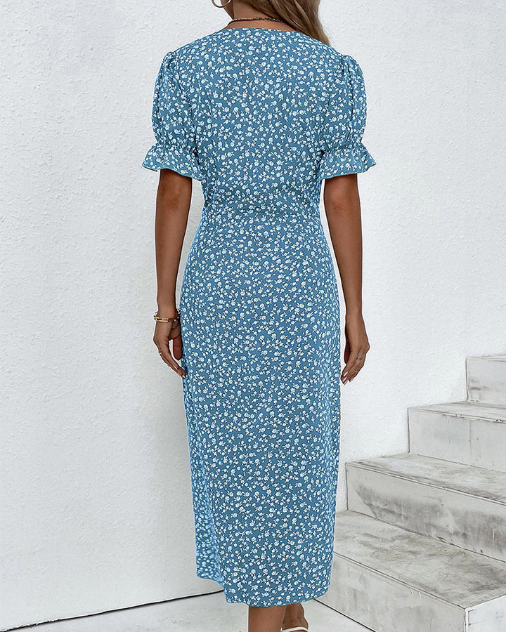 Chic women's V-neck floral midi wrap dress, elegant spring fashion, comfortable fit.