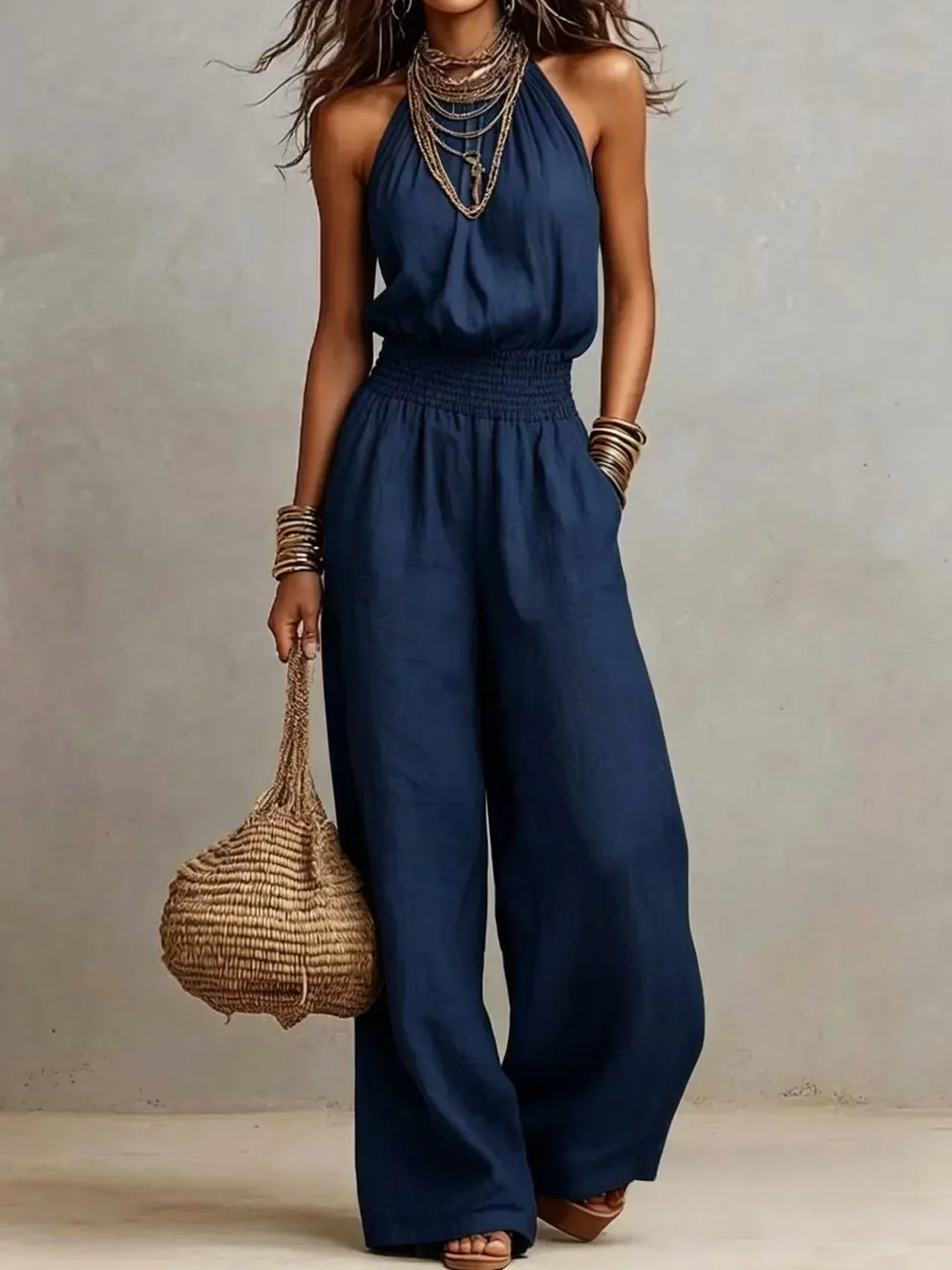 Versatile women's wide leg halter jumpsuit, offering comfort and chic elegance for summer, vacation, or casual wear.
