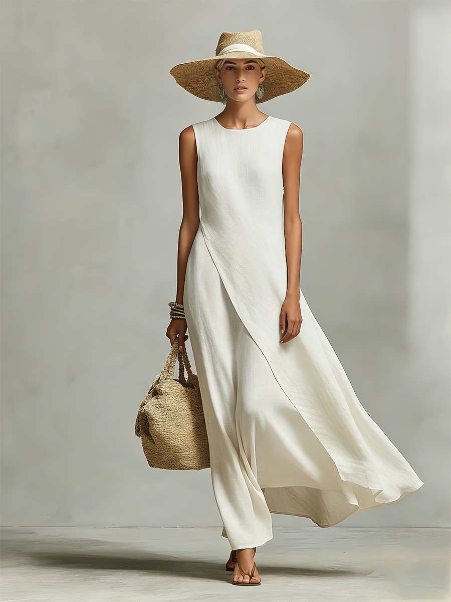 Comfortable ivory sleeveless maxi dress with a stylish flowy asymmetric hem, ideal for day-to-night wear.