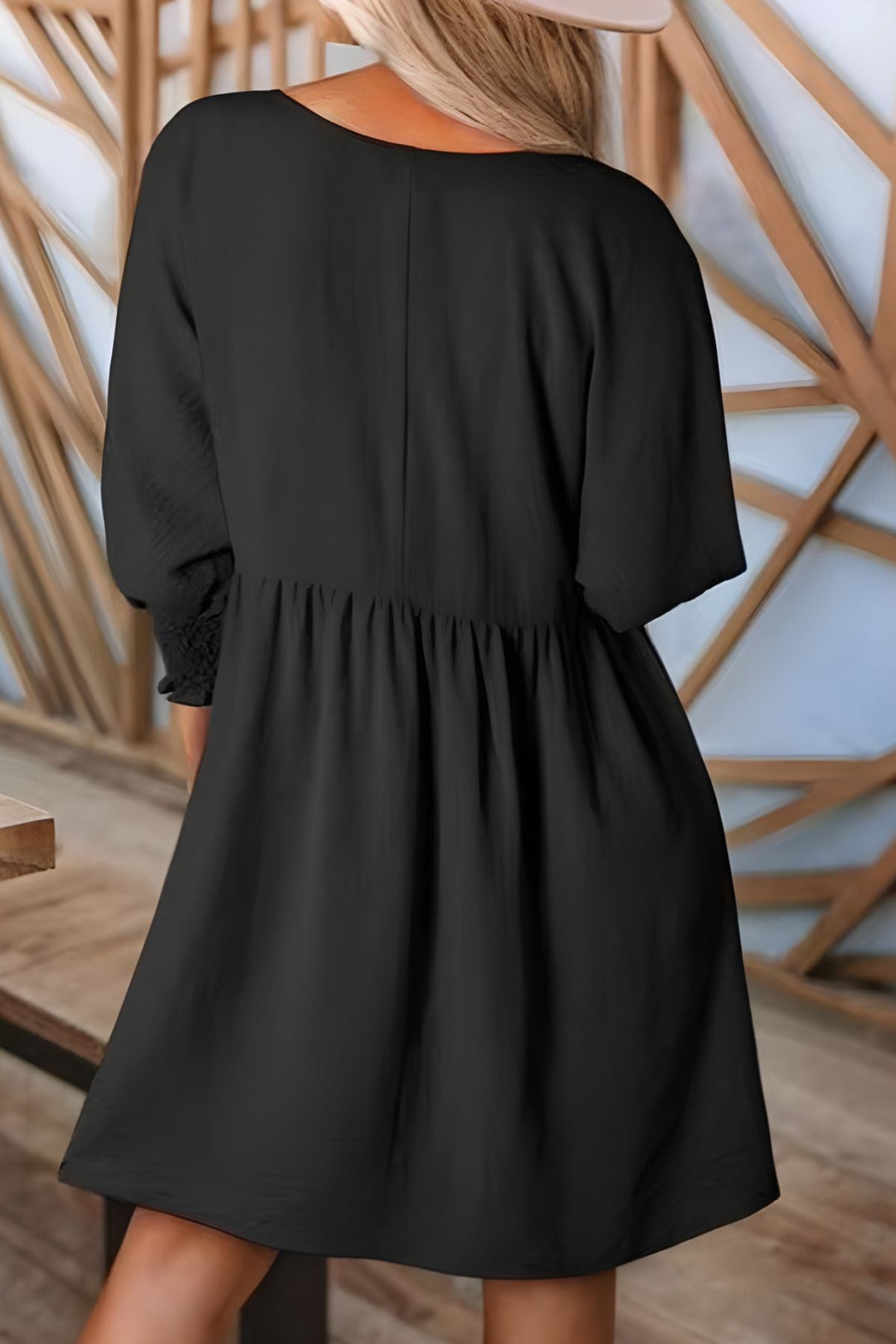 Women's mini babydoll dress, flowy & casual with smocked cuffs. Perfect half-sleeve style for spring/summer.