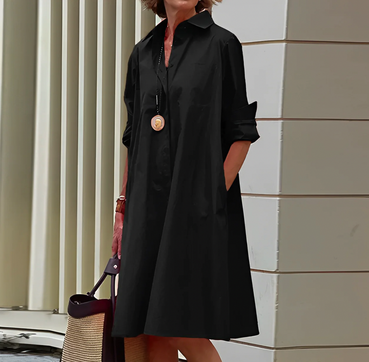 Comfortable women's flowy midi dress with buttons. A versatile shirt dress for office, casual, or evening elegant fashion.