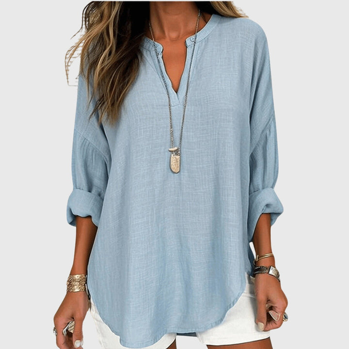 Women's flowy elegant long sleeve beach shirt, perfect for summer vacation and chic casual wear.