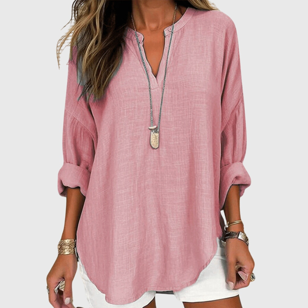 Flowy long sleeve shirt for women, an elegant and chic beach top, great for casual summer fashion.