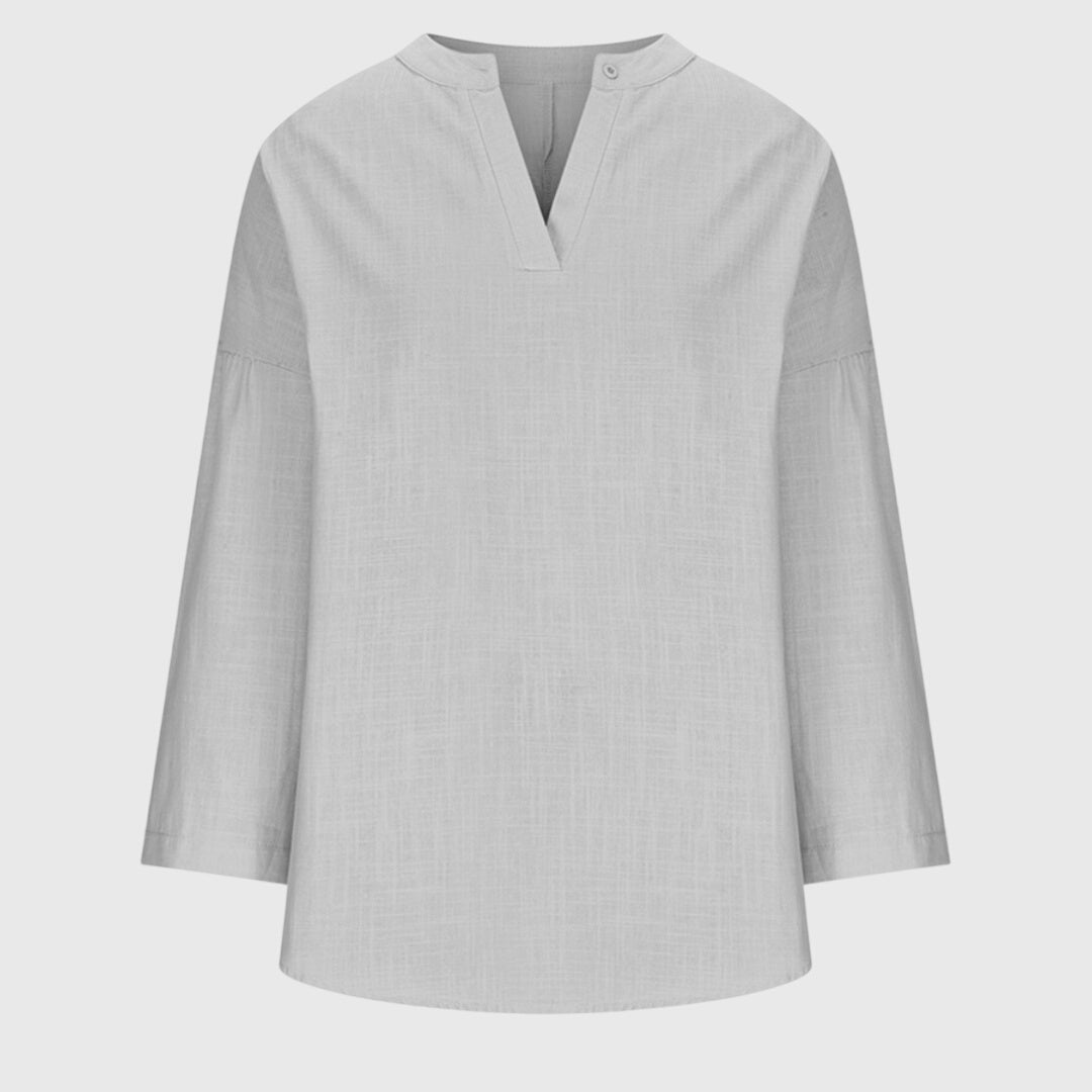 Versatile women's flowy long sleeve shirt, an elegant beach top for casual, chic summer style.
