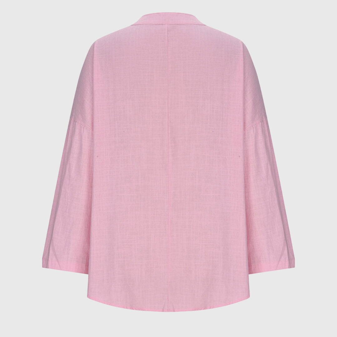Women's elegant flowy long sleeve shirt, a chic beachwear top perfect for resort and summer style.