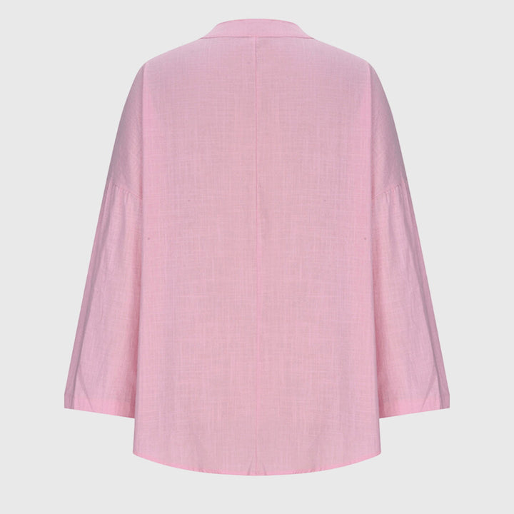 Women's elegant flowy long sleeve shirt, a chic beachwear top perfect for resort and summer style.