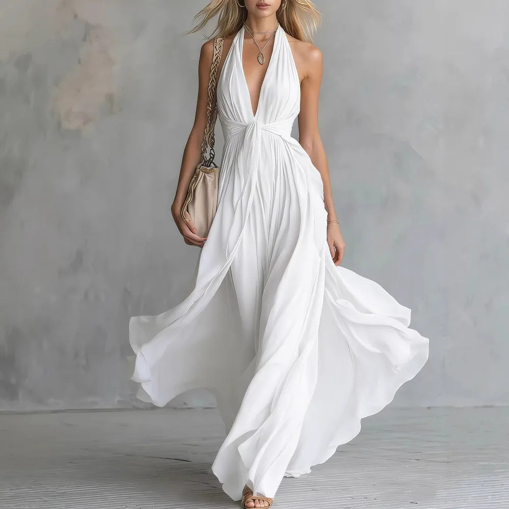 Elegant women's halter maxi gown in a flowy pleated design, ideal as a backless party or special occasion dress.