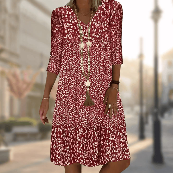 Comfortable women's floral print tiered summer dress, flowy design for a stylish casual look, available in plus size.