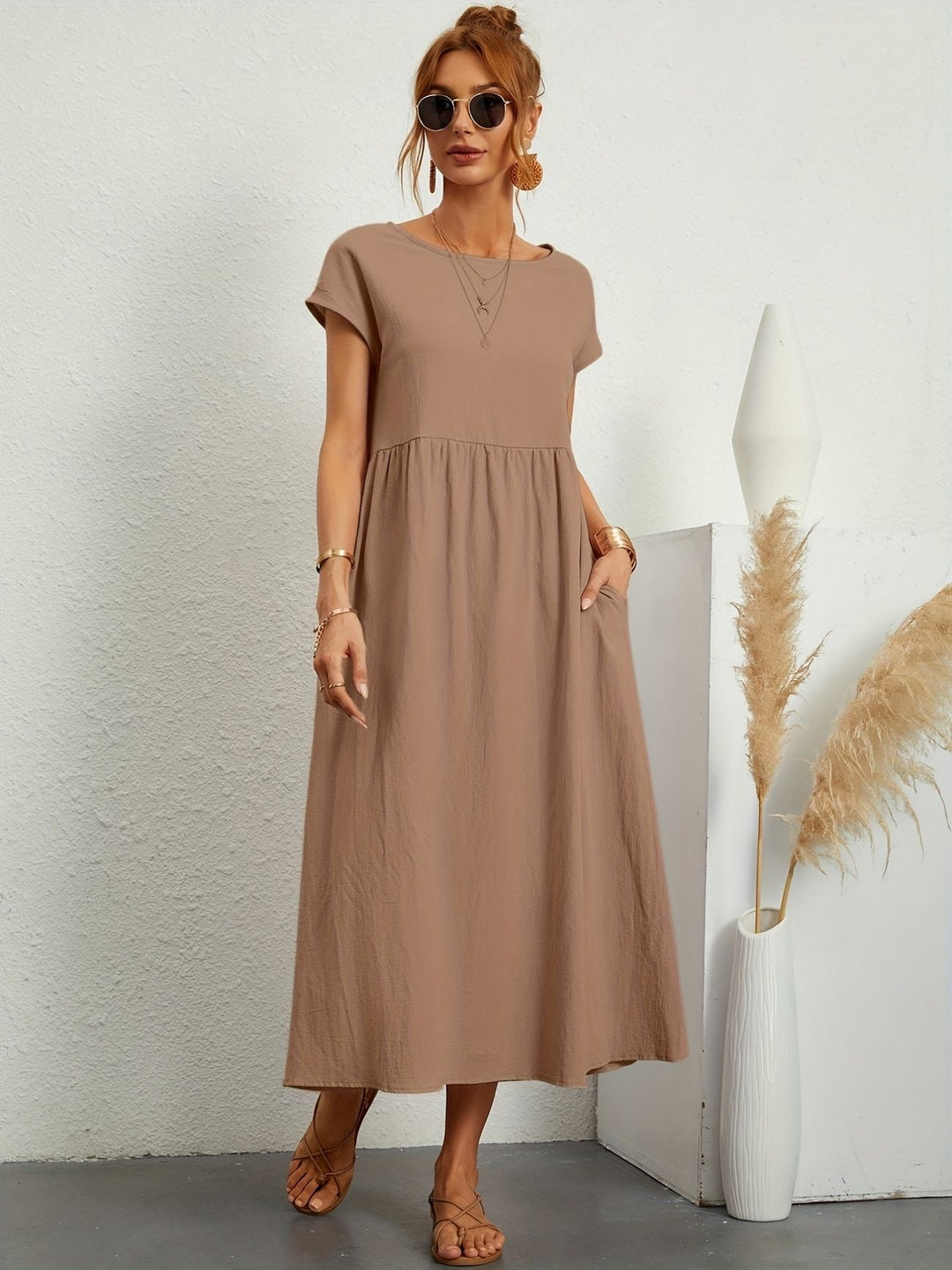 Classic round neck detail of a women's short sleeve flowy maxi dress, offering casual comfort & style.