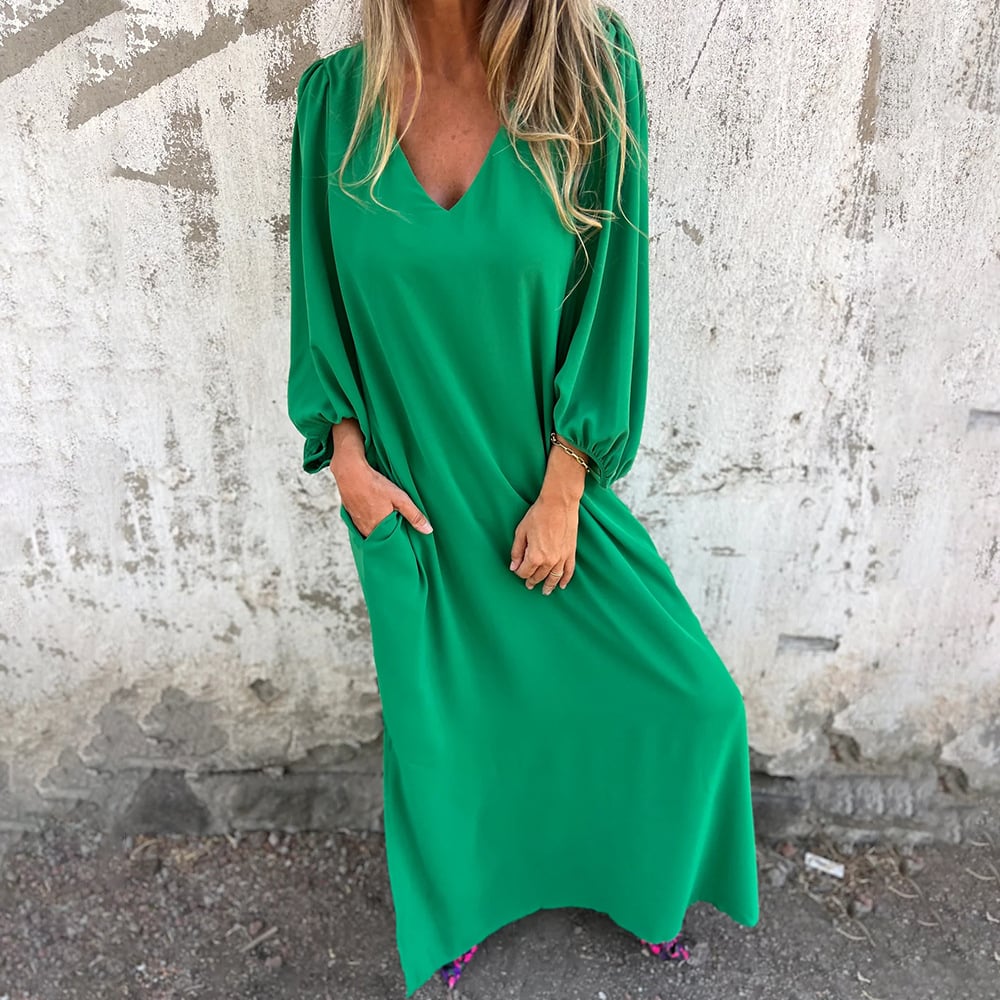 Sale: Women's comfortable flowy maxi dress with stylish balloon sleeves and practical pockets. Great for day or party.