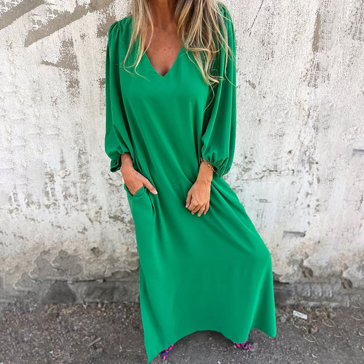 Sale: Women's comfortable flowy maxi dress with stylish balloon sleeves and practical pockets. Great for day or party.