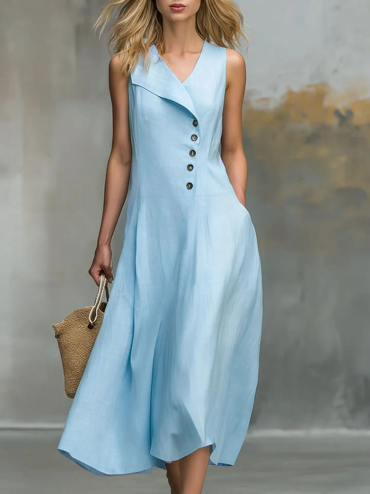 Comfortable V-neck flowy midi dress for women, featuring button detail and a relaxed fit for effortless summer wear.