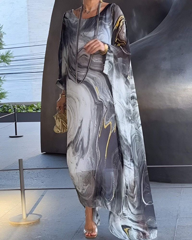 Casual women's flowy midi dress, ideal for summer. Tummy coverage and flattering fit for everyday elegance.