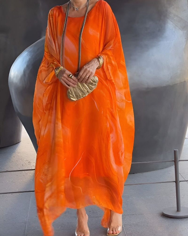 Soft flowy women's midi dress, offers flattering tummy coverage for ultimate comfort and elegant everyday style.