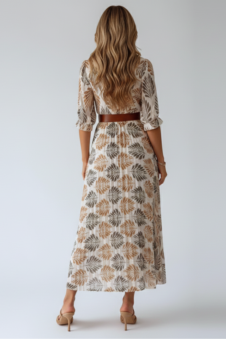 Stylish women's long patterned maxi dress with comfortable elbow sleeves, a versatile spring and summer dress.