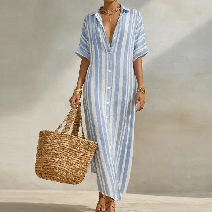 Elegant women's flowy striped long summer dress with a relaxed fit, V-neck, and three-quarter sleeves.