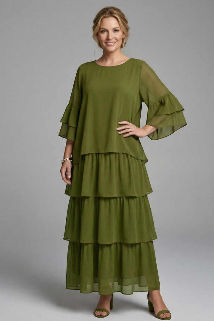 Fashionable women's tiered maxi dress, long and flowy with a round neck and relaxed, casual fit.