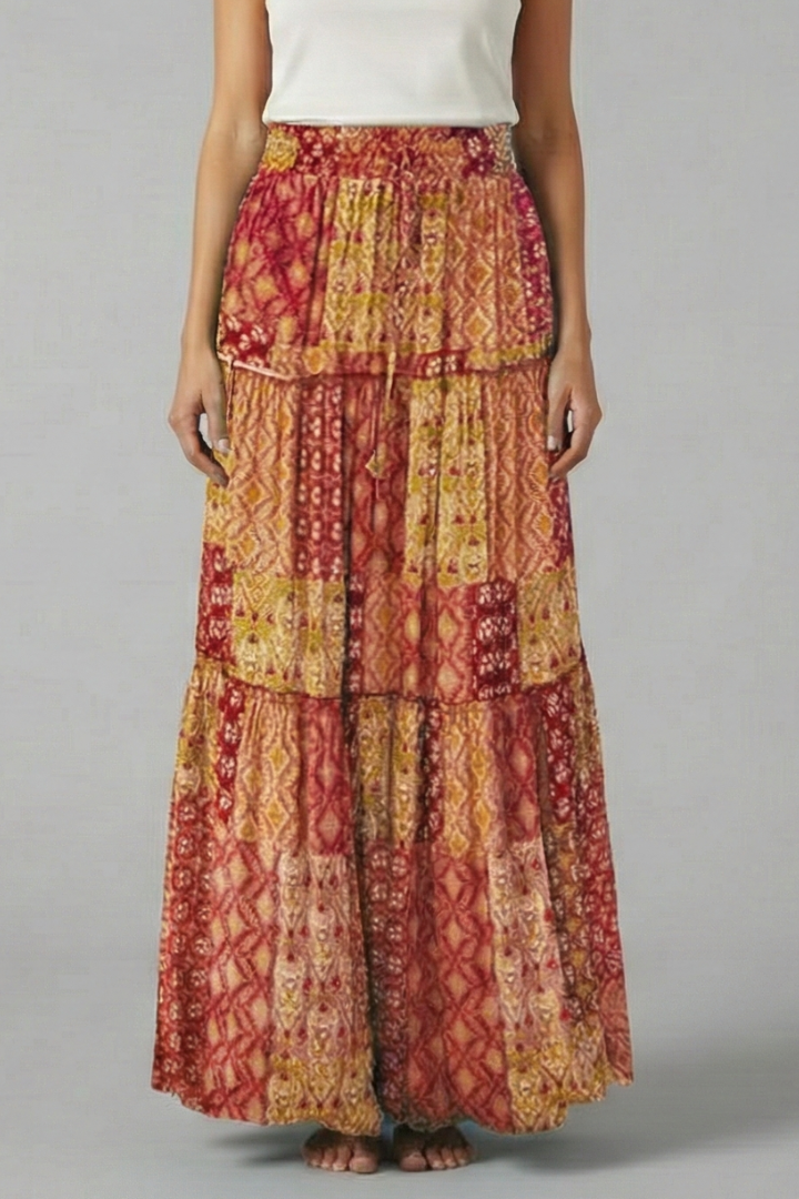Women's comfortable pull-on maxi skirt. Flowy tiered design with an elastic waist for easy, elegant style.
