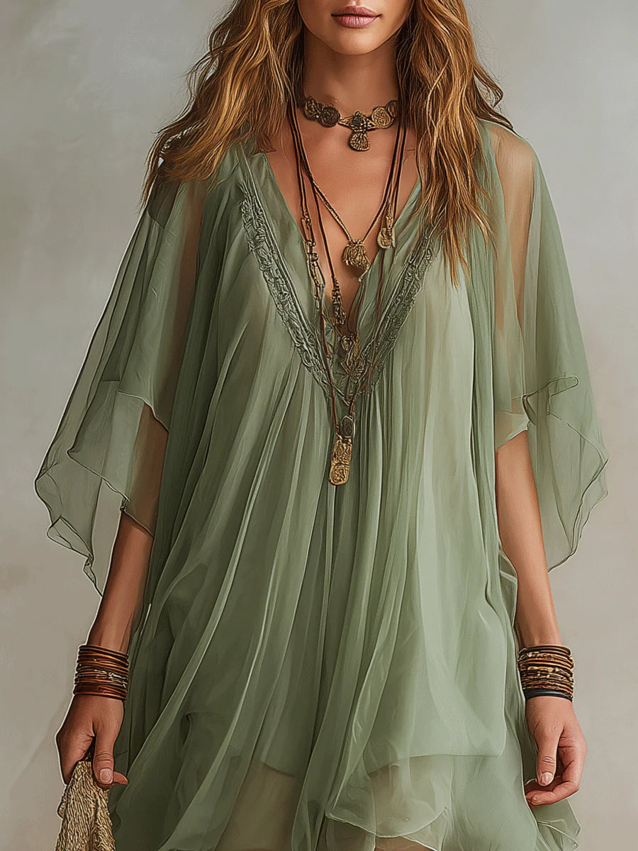 Women's casual flowy V-neck layered mini dress, a comfortable and stylish tiered summer beach outfit.
