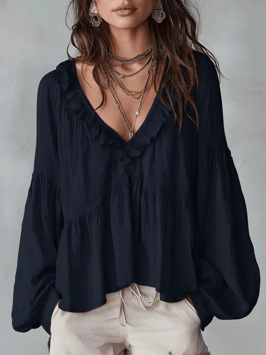 Chic ladies' V-neck ruffle top with puff sleeves, a comfortable and stylish casual blouse for spring/summer.