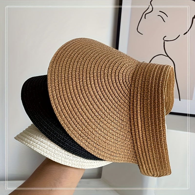 Women's foldable wide brim sun visor, ideal for beach, travel, and effective UV protection. A summer accessory.