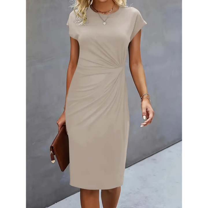 Fitted women's formal midi dress with flattering ruched waist, bodycon silhouette & cap sleeves. Sophisticated style.
