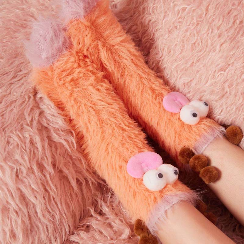 Warm coral velvet socks for women, featuring a fun 3D cartoon character