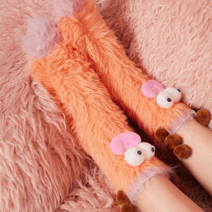 Warm coral velvet socks for women, featuring a fun 3D cartoon character