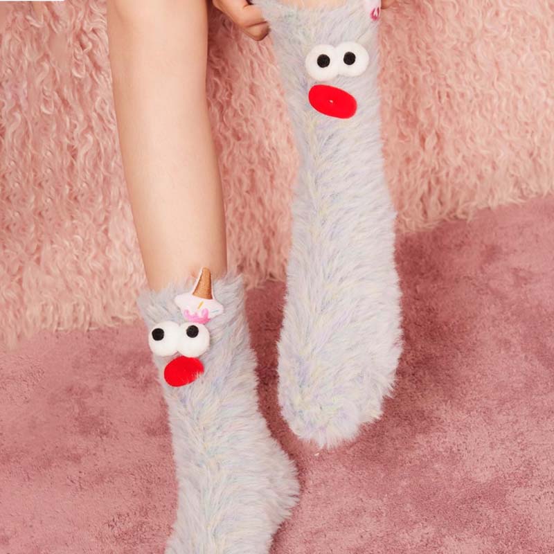 Detailed view of the plush coral velvet texture on 3D cozy socks for women