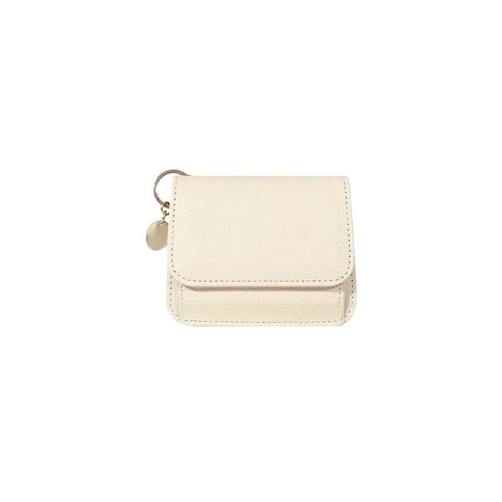 Genuine leather mini coin purse in a soft pastel shade, a charming accessory for women.