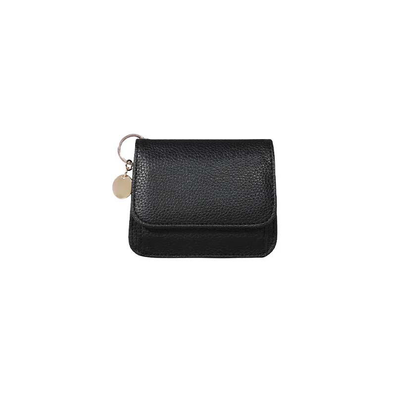Slim profile of a women's genuine leather coin purse, ideal for fitting into smaller bags.