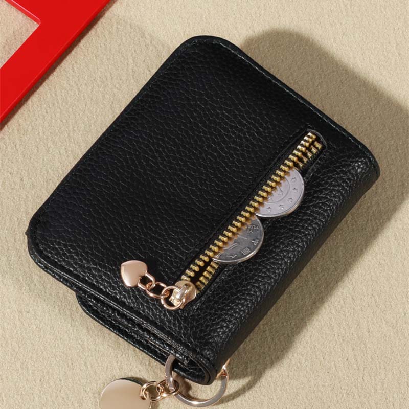 Stylish women's mini coin purse made from real leather, a durable and chic accessory.