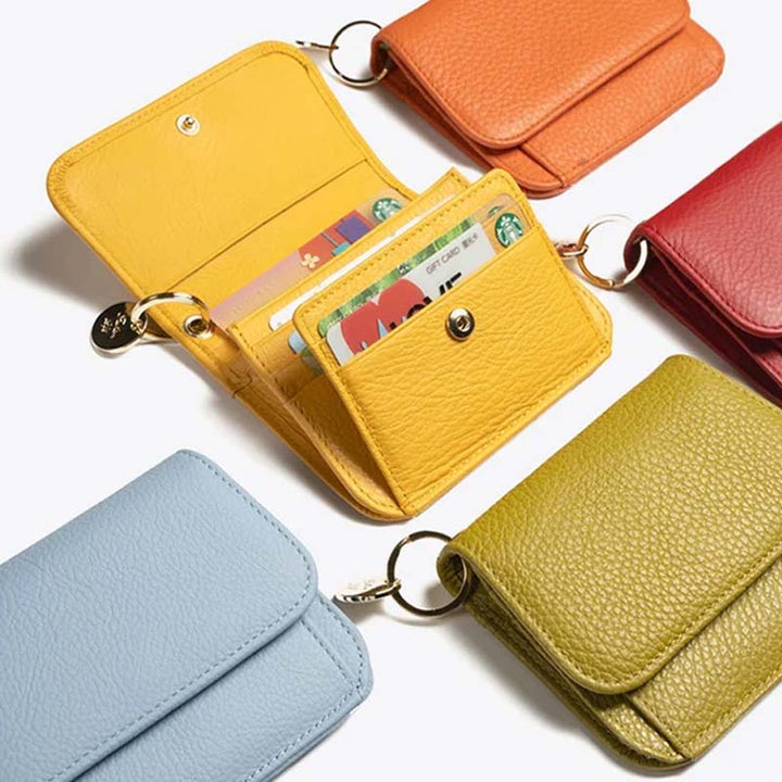 Blue genuine leather mini coin purse for women, a vibrant and essential everyday carry item.