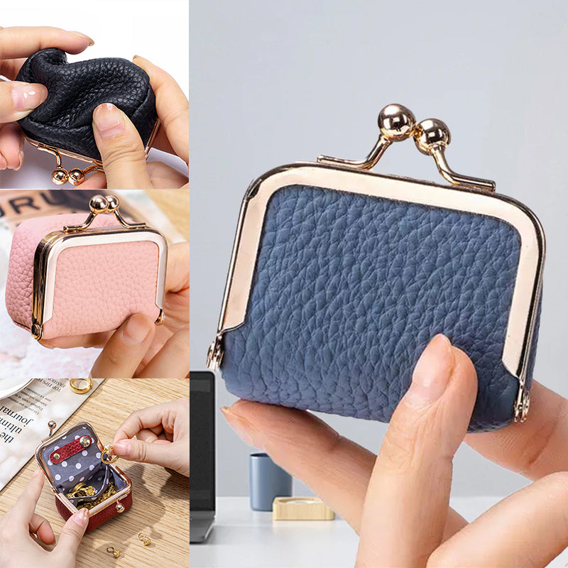 Genuine leather mini jewelry box for women, stylish and portable, keeps your travel accessories organized.