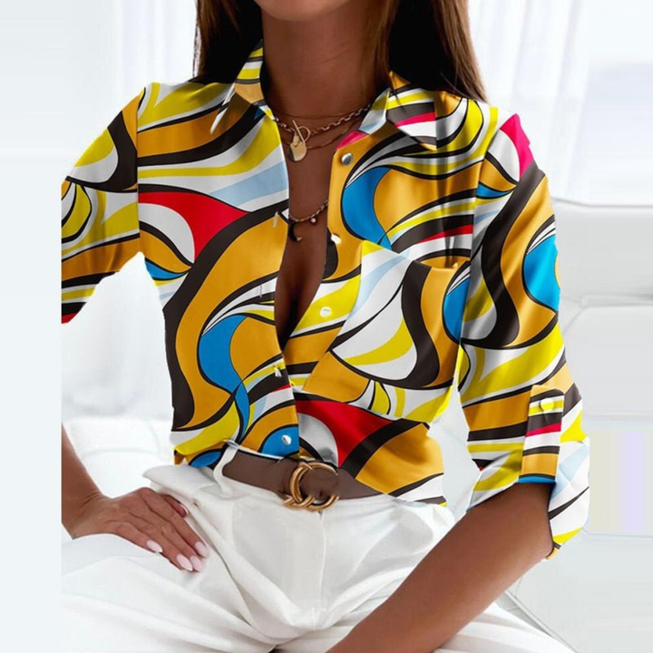 Modern geometric print women's long sleeve button-down blouse, sophisticated and chic fashion top.