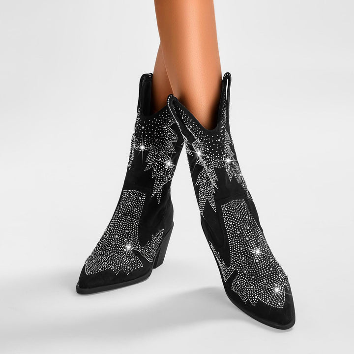 Sparkling women's cowboy boots featuring intricate rhinestone embellishments, perfect for a fashion statement