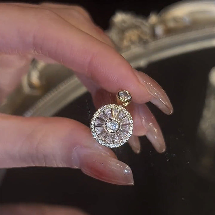 Women's gold crystal spinner ring for anxiety relief, adjustable band for comfortable wear.