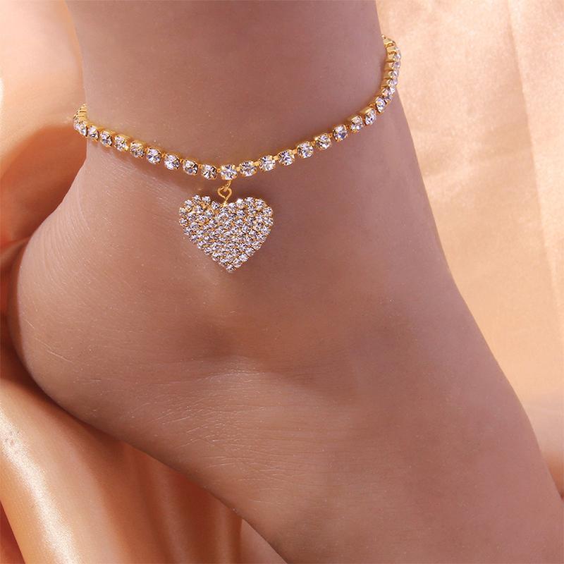 Trendy silver heart charm anklet for women with sparkling rhinestones, ideal foot jewelry.