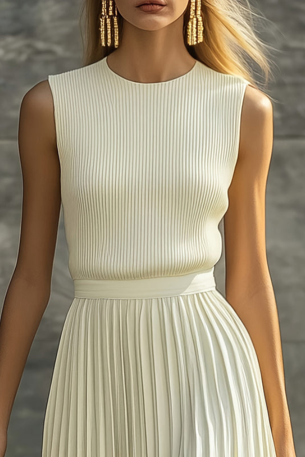Elegant women's sleeveless midi dress featuring delicate pleats and a comfortable flowy design, great for any season.