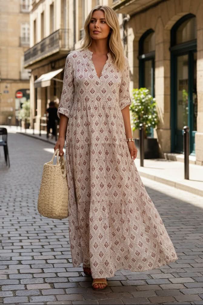 Flowy Women's Tiered Maxi Dress, elegant and comfortable for summer or casual wear.