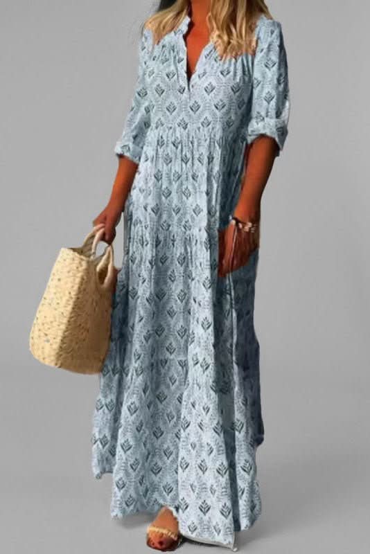Sophisticated women's tiered maxi dress, offering flowing elegance for elegant occasions or summer.